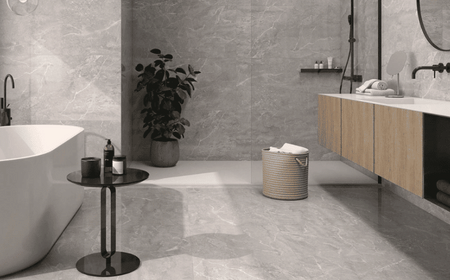Lesklá dlažba do kúpeľne v sivej farbe imitujúca kameň